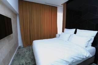 Отель Valentino Rooms Фокшани Номер-студио с кроватью размера "king-size" и диван-кроватью-7